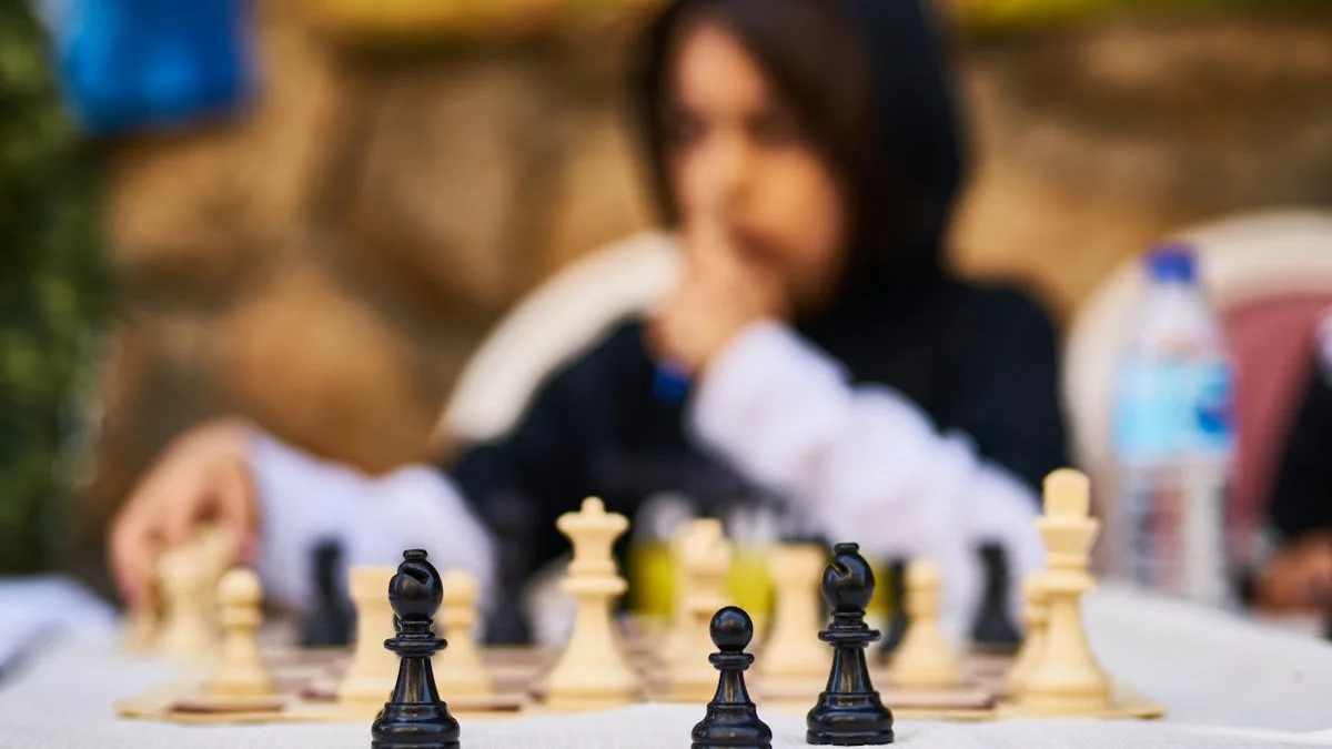 A child plays chess on a tablet during a long car ride